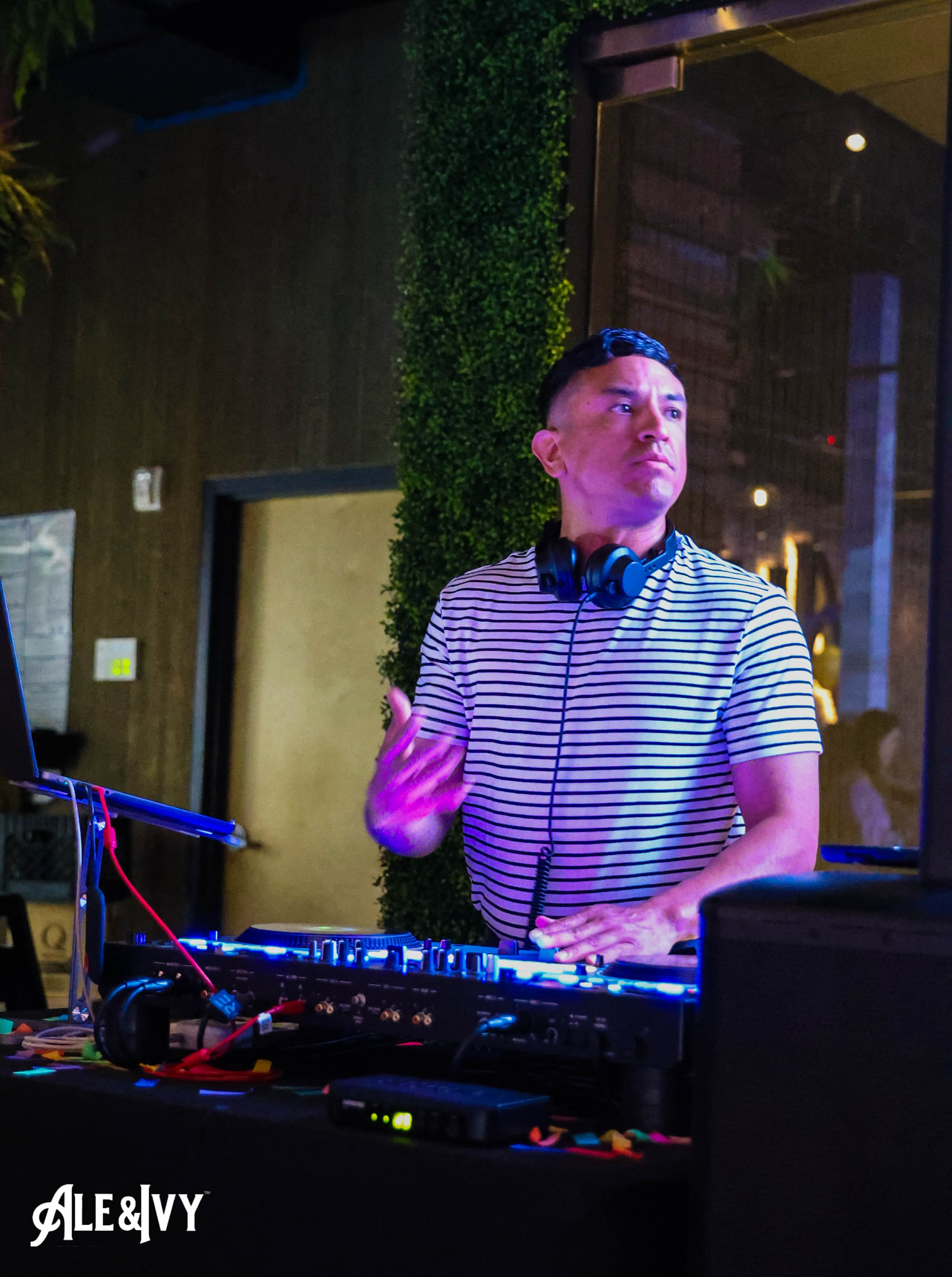 A DJ performing at Ale & Ivy